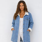 Oversized sherpa-lined denim jacket in blue with white sherpa collar and cuffs