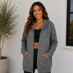 Women's oversized gray zip-up hooded jacket front view