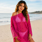 Pink crochet beach cover-up worn over a swimsuit at the beach