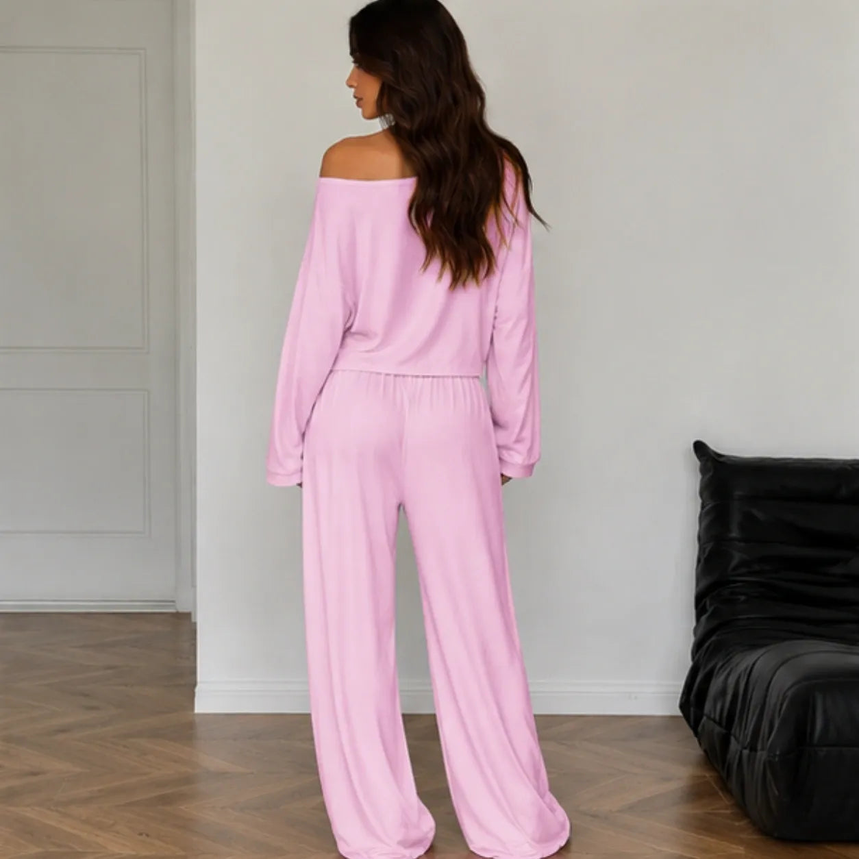 Pink women's two-piece wide-leg pants set shown from the back