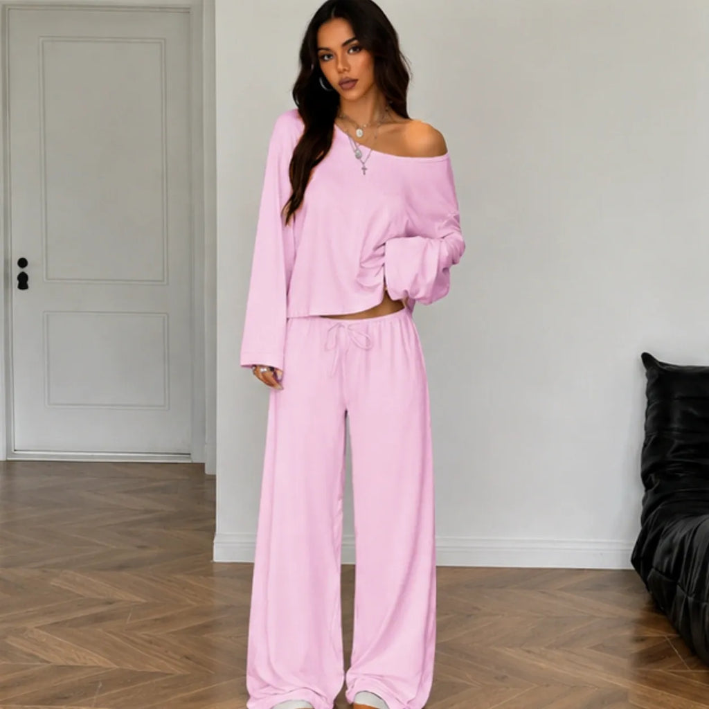 Pink women's two-piece wide-leg pants set with off-shoulder long sleeve top front view