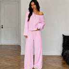 Pink women's two-piece wide-leg pants set with off-shoulder long sleeve top front view