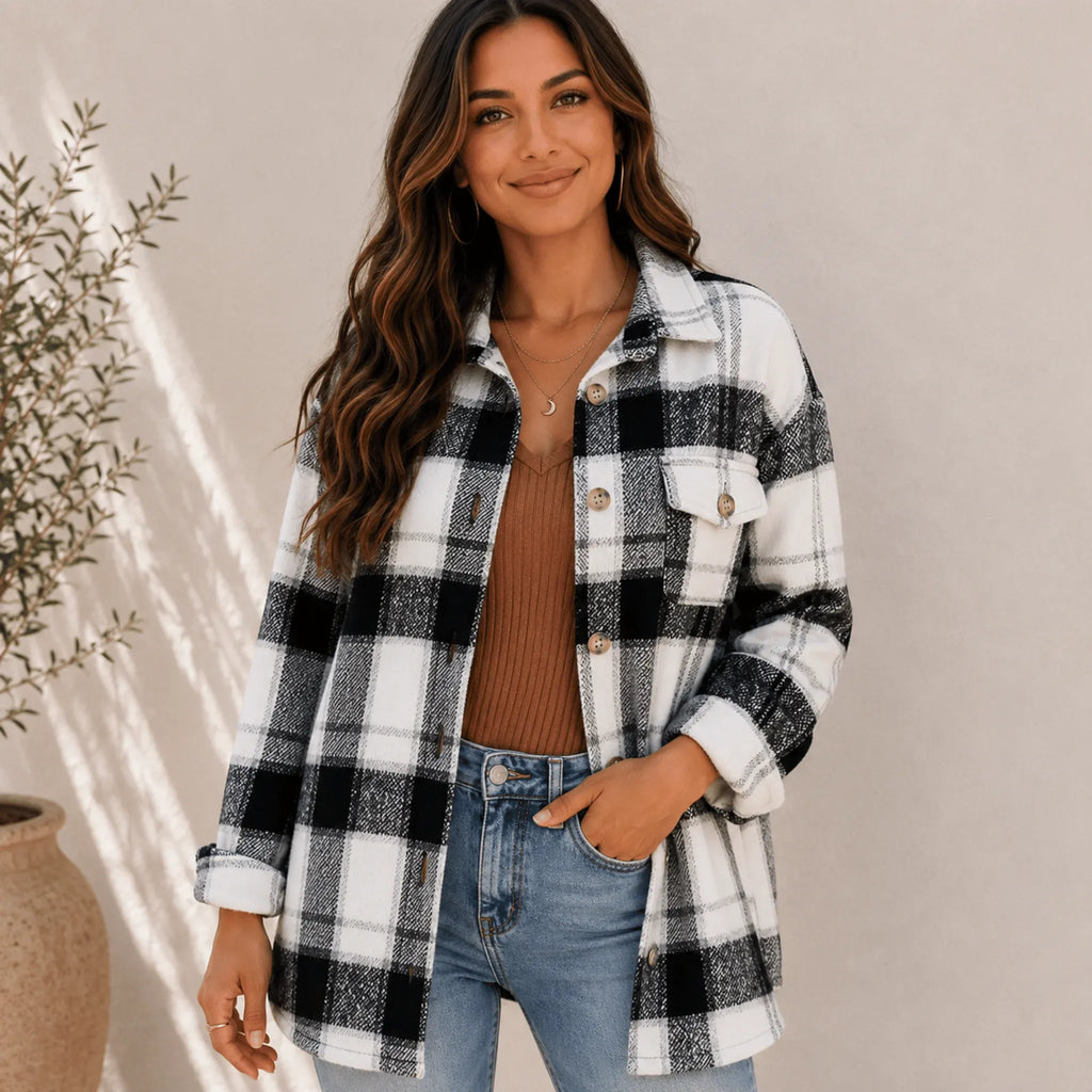 Women's black plaid flannel button-up jacket with a loose fit, shirt collar, chest flap pockets, and button-front closure.