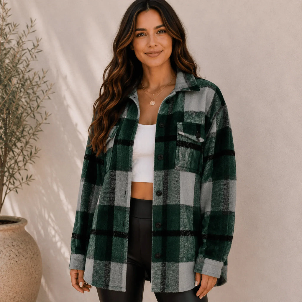 Women's green plaid flannel button-up jacket featuring a relaxed oversized fit, button-front closure, shirt collar, and chest flap pockets.