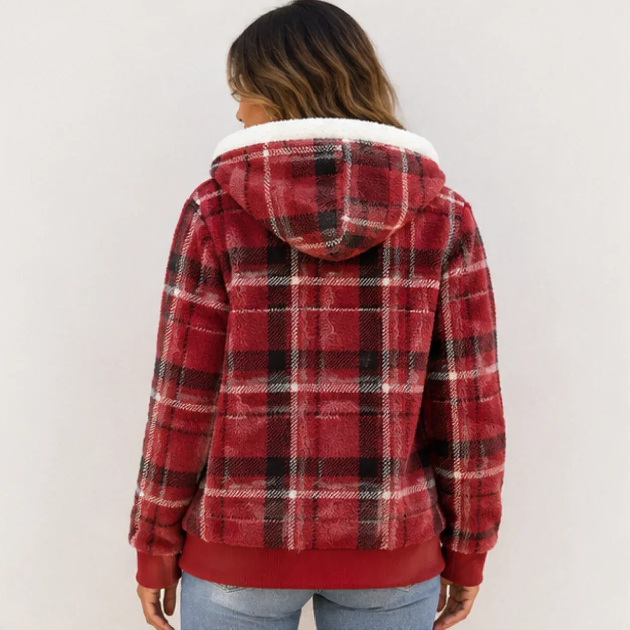 Back view of women's red plaid fleece-lined hooded zip-up jacket with cozy sherpa-lined hood