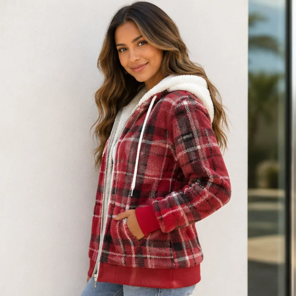Side view of women's red plaid fleece-lined hooded zip-up jacket with sherpa-lined hood and pockets