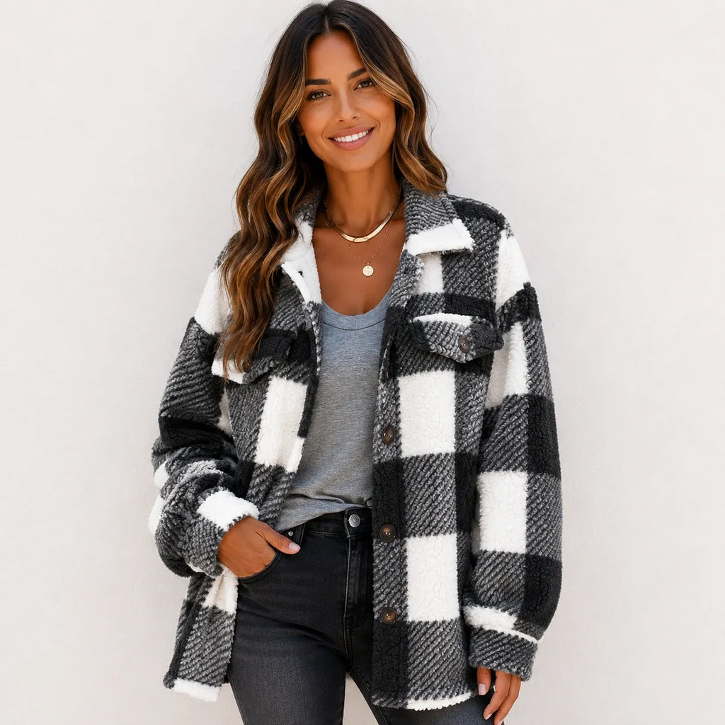 Black and white plaid plush fleece button-down jacket on model