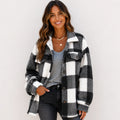 Black and white plaid plush fleece button-down jacket on model