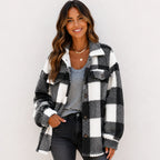 Black and white plaid plush fleece button-down jacket on model