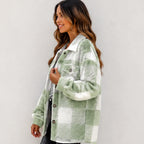 Side view of sage green and white plaid plush fleece button-down jacket