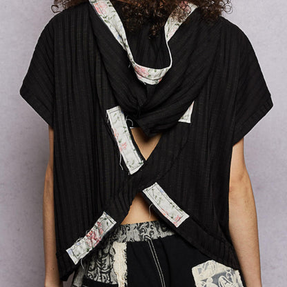 POL black short sleeve hooded top showing stylish open back — back view.