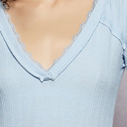 POL powder blue v-neck long sleeve ribbed top with delicate lace trim — complete presentation.