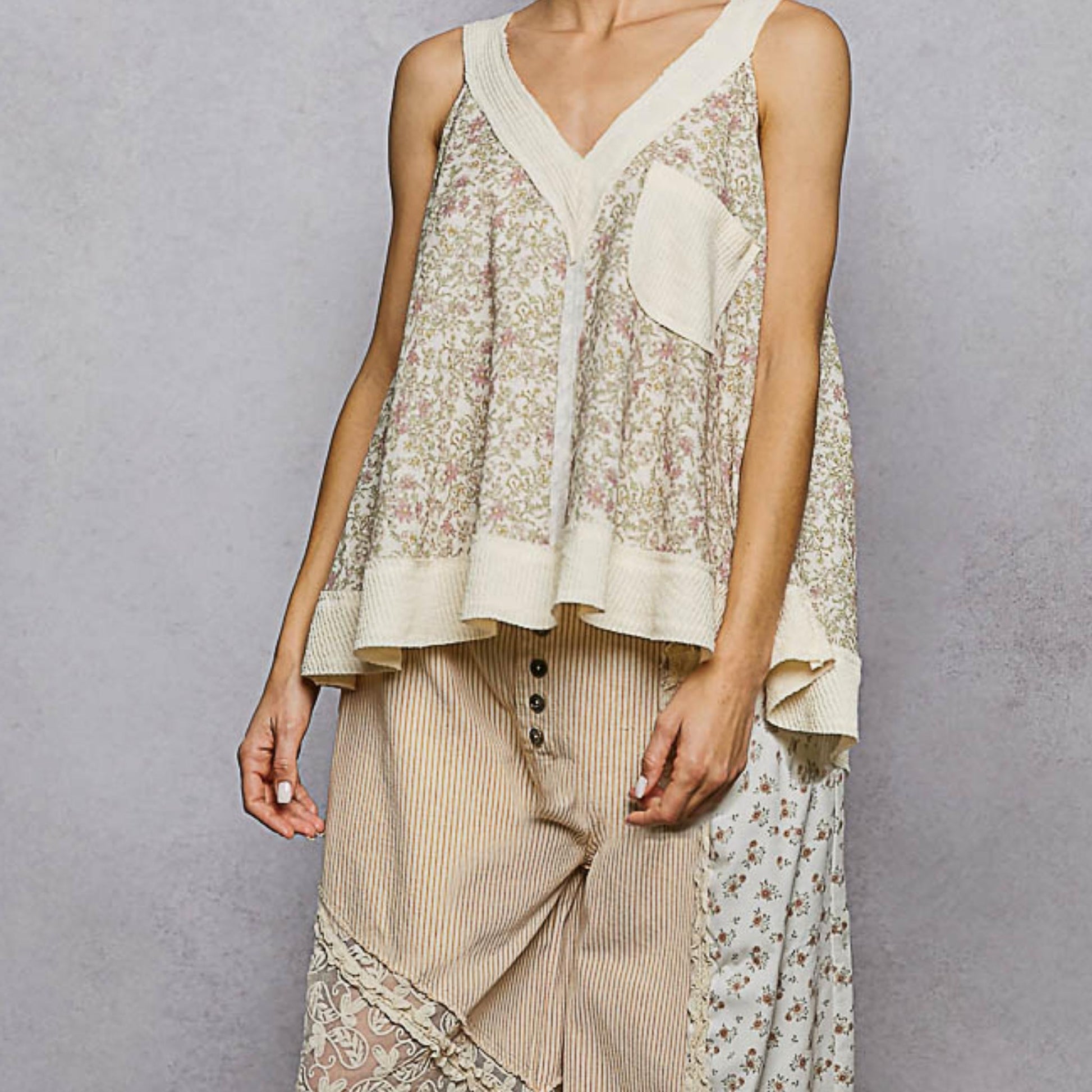 Frontal view of the POL sleeveless rayon top highlighting the floral pattern.