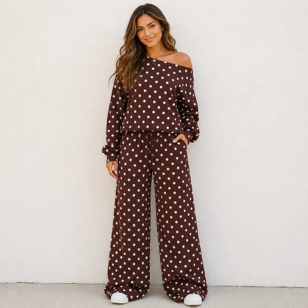 Woman wearing a coffee brown polka dot off-the-shoulder top and wide-leg pants set