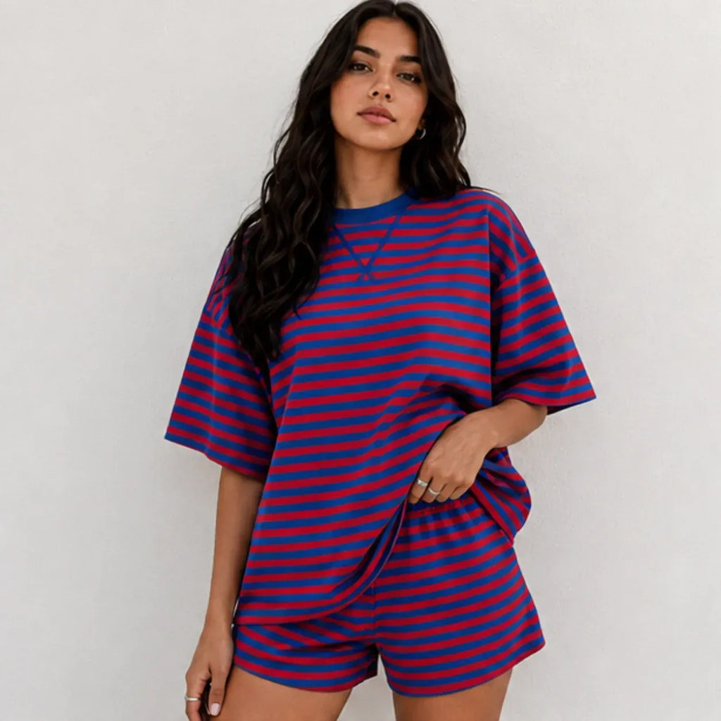 Front view of model wearing red and royal blue horizontal striped short-sleeve lounge set