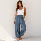 Women's relaxed wide leg cotton pants in steel blue with elastic waistband and relaxed fit.