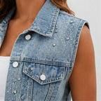 Close-up of rhinestone embellishments on blue denim vest