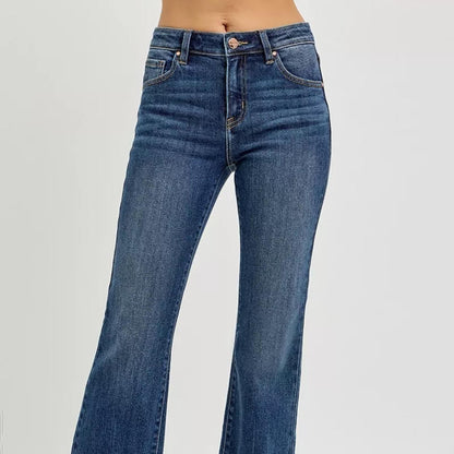 Front view of RISEN mid-rise flare jeans in a rich dark wash.