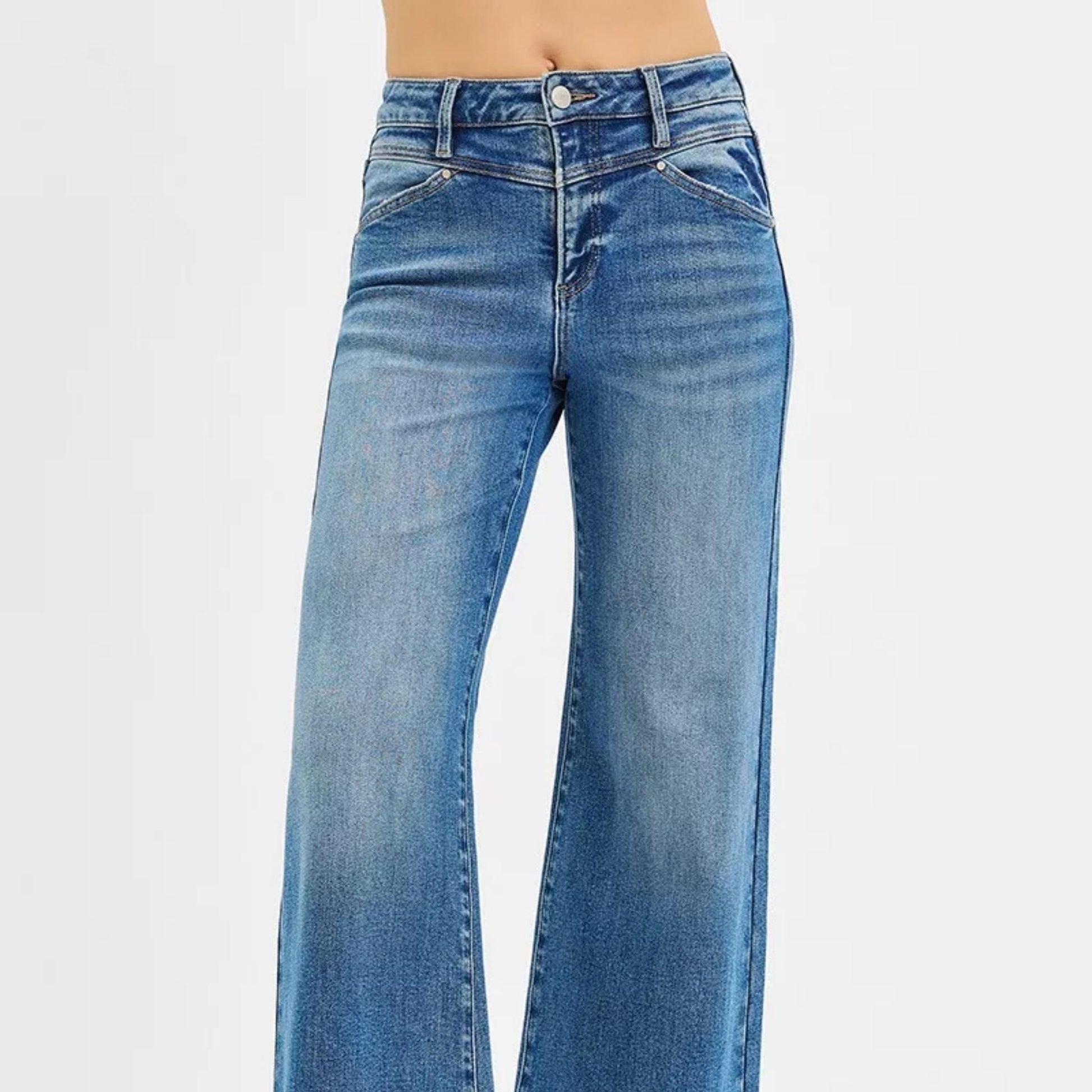 Full presentation of the RISEN high-rise wide-leg jeans with heart pocket accents.