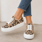 Leopard print Roam Wild Convertible Sneakers featuring a comfortable white platform sole and lace-up closure.