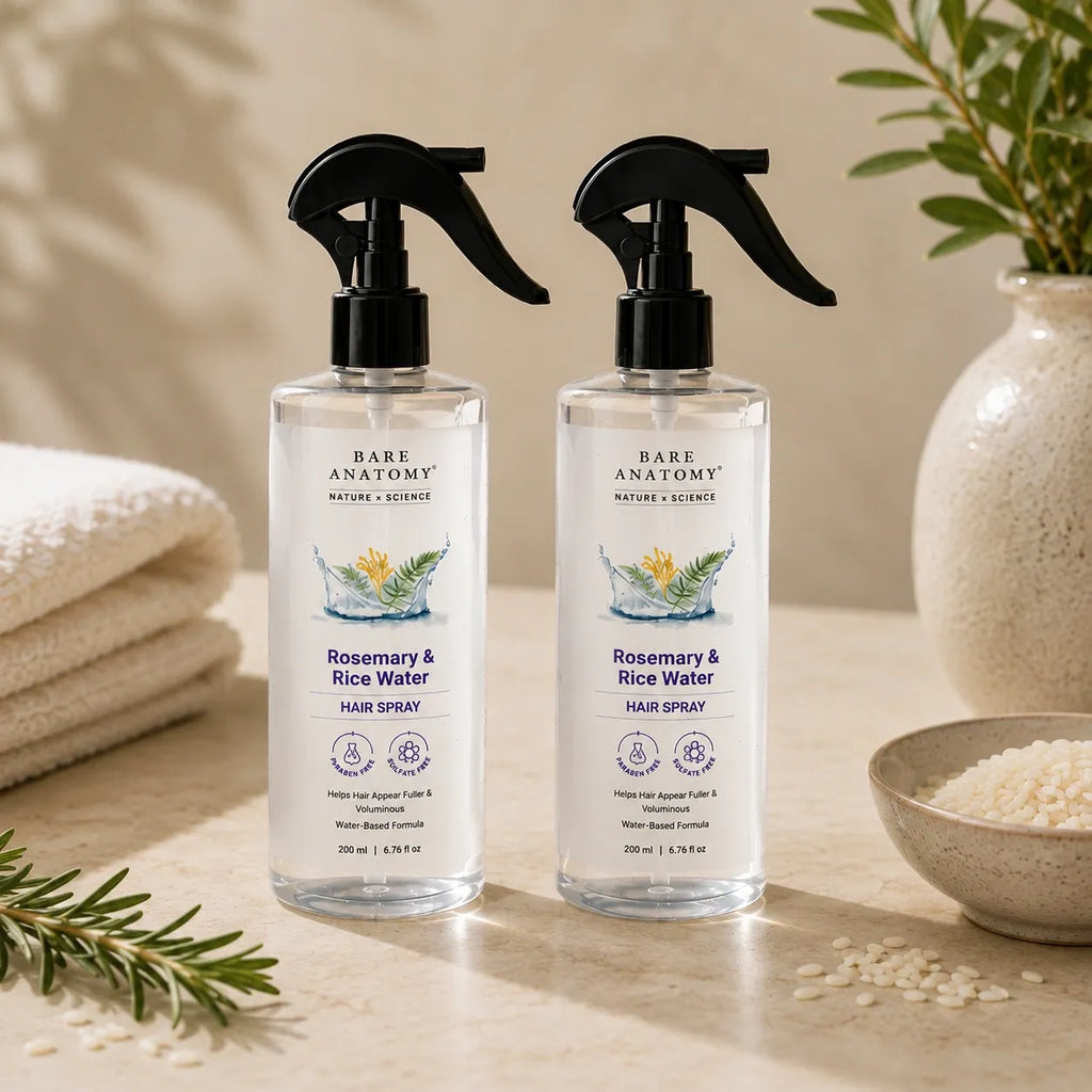 Two bottles of rosemary and rice water hair spray displayed together