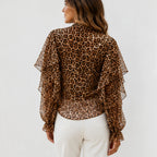 Back view of the women's leopard print ruffle chiffon long sleeve blouse featuring sheer chiffon fabric, long sleeves, and a lightweight draped silhouette.