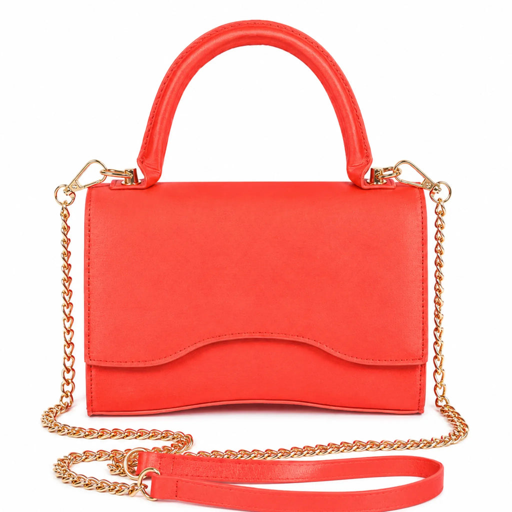 Red Shiny Chain Crossbody Bag with gold chain strap and structured top handle from Solazura Boutique.