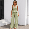 Women's sleeveless striped wide-leg pants two-piece set in aqua green with a lightweight peplum top and flowy pants.