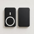 Small portable magnetic wireless power bank in black showing front and back