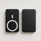 Small portable magnetic wireless power bank in black showing front and back