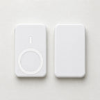 Small portable magnetic wireless power bank in white showing front and back