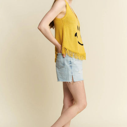 Alternate side view of the mustard yellow smiley face graphic tank.