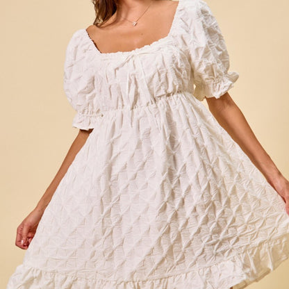 Front view of the SO ME off white texture woven mini dress with puff sleeves.
