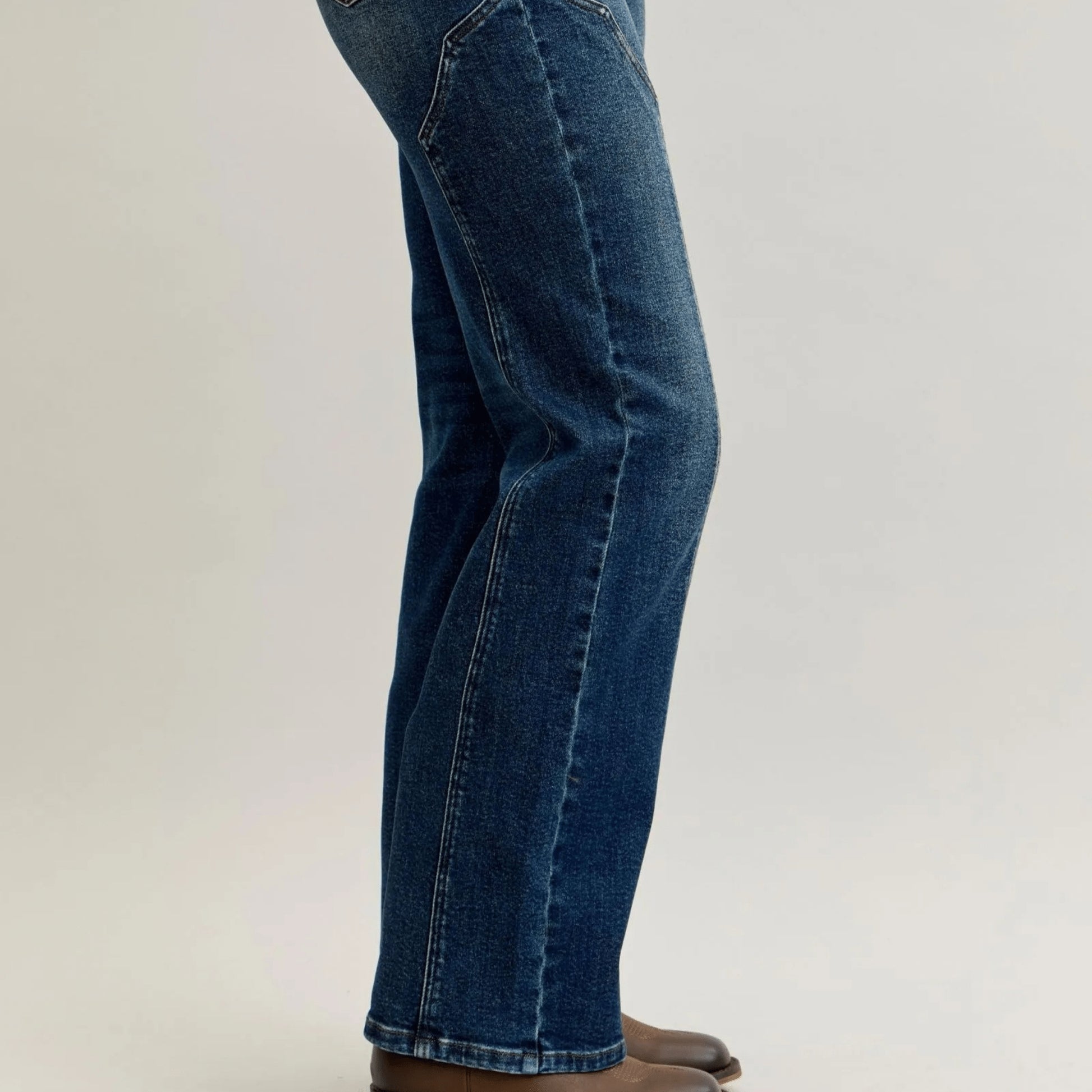 Close-up of the unique side seam stitching on Judy Blue straight-leg denim.