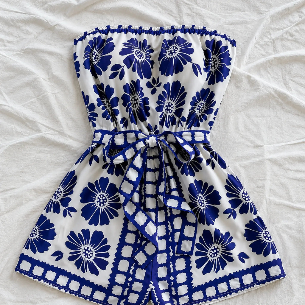 strapless-tie-waist-romper-blue-floral-print-flat-lay-solazura-boutique.webp