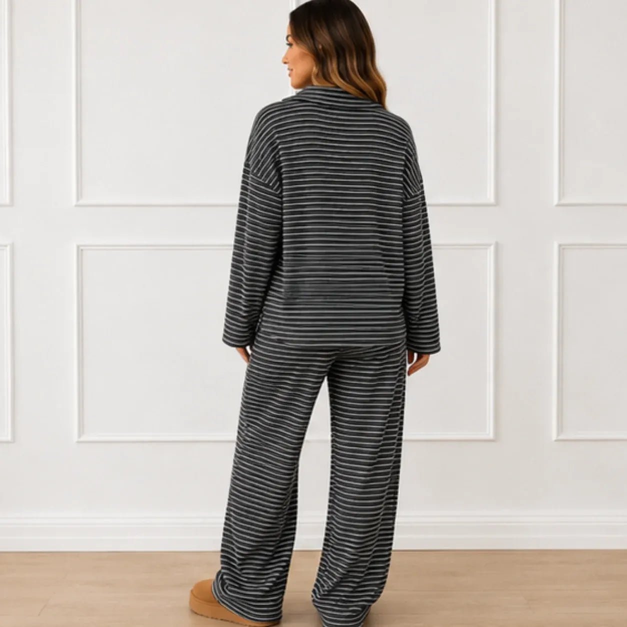 Back view of the black striped collared long-sleeve top and wide-leg pants set