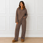 Woman wearing the brown striped collared long-sleeve top and wide-leg pants set