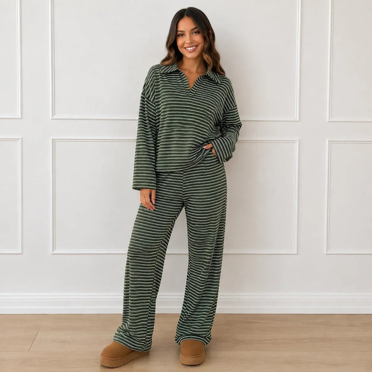 Woman wearing the green striped collared long-sleeve top and wide-leg pants set