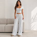 Model wearing the Striped Crop Top & Wide-Leg Lounge Set in light gray with a square neck crop top and wide-leg lounge pants.