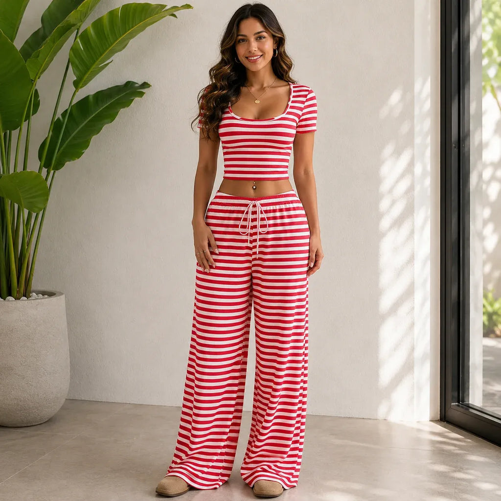 Model wearing the Striped Crop Top & Wide-Leg Lounge Set in red with a striped crop top and flowy wide-leg lounge pants.