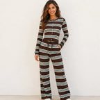 Woman wearing the brown striped knit button-up top and wide-leg pants set