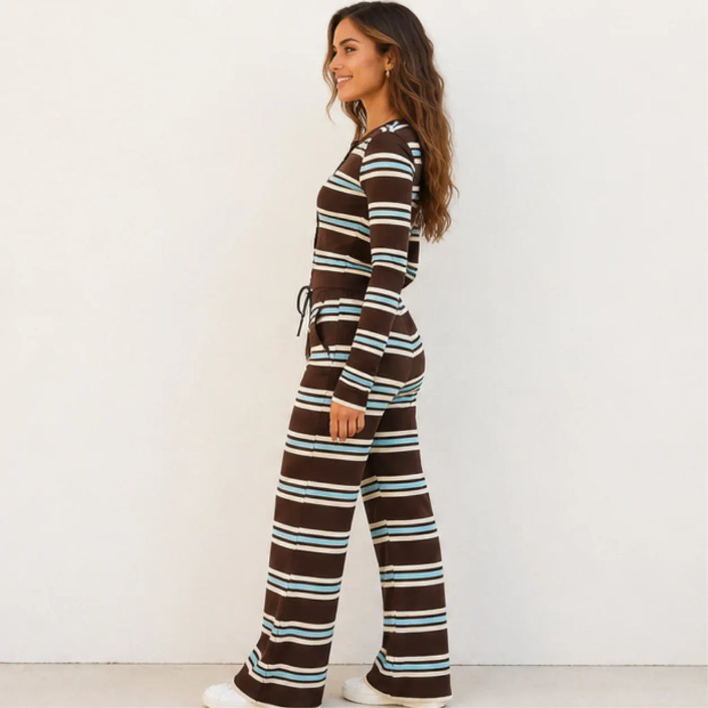 Side view of woman wearing the brown striped knit button-up top and wide-leg pants set