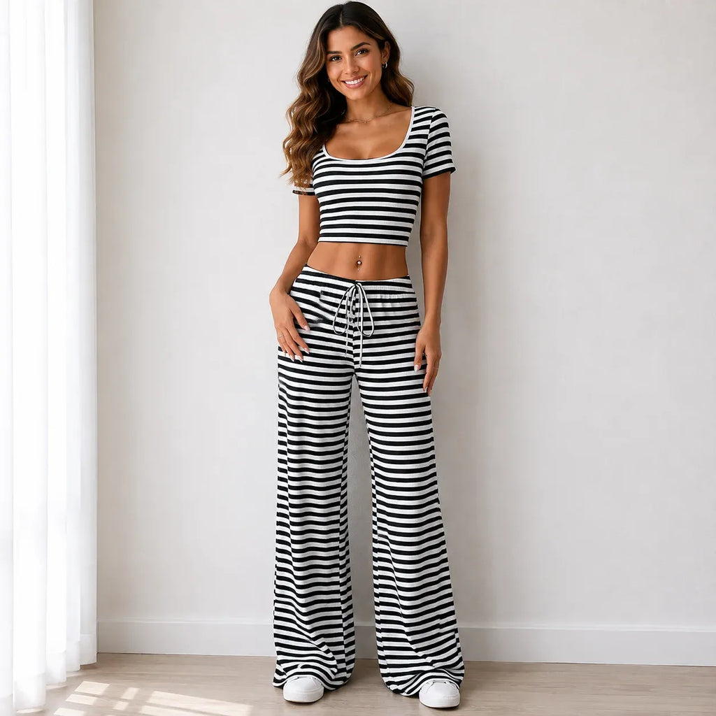 Black striped knit two-piece pants set with short-sleeve crop top and wide-leg pants