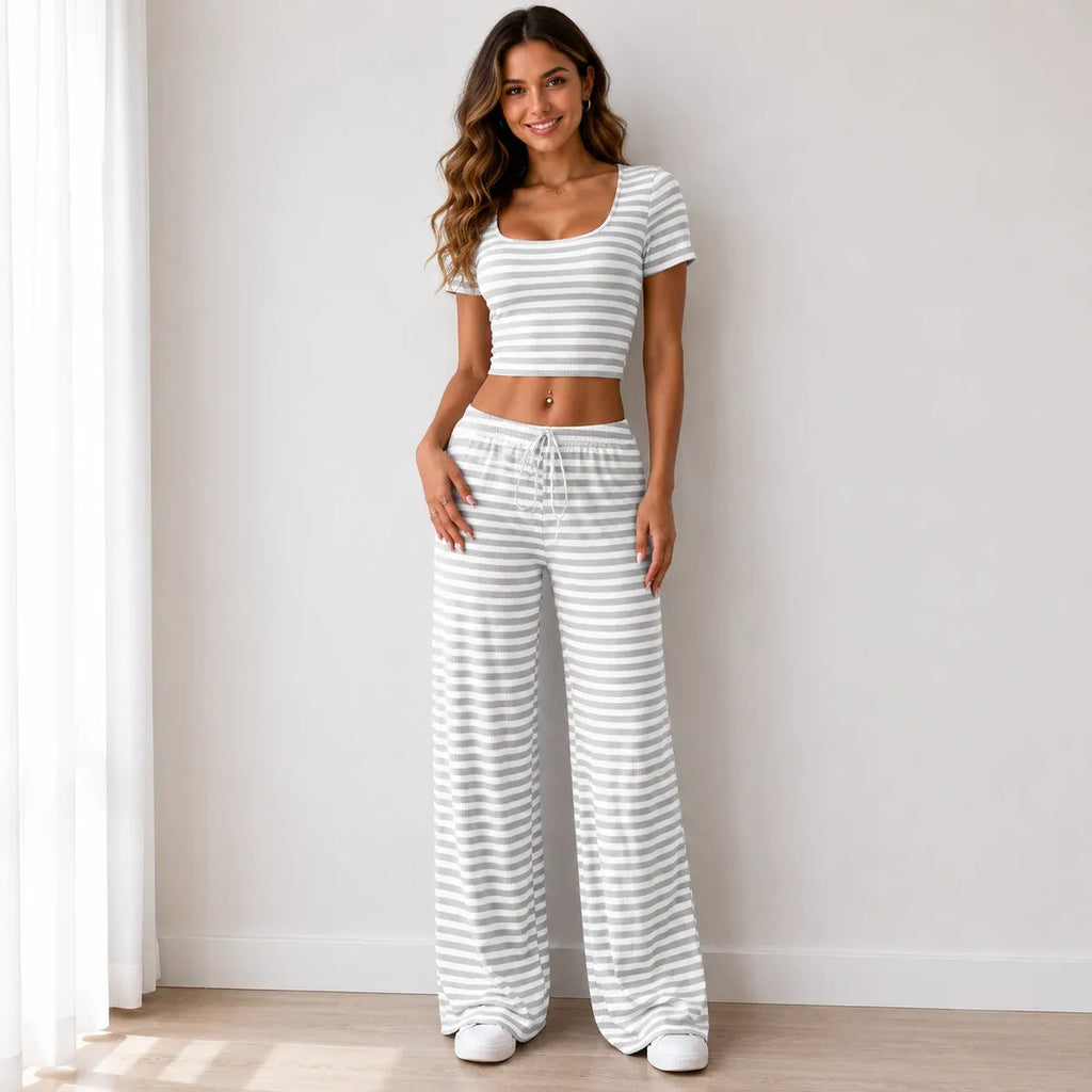 Gray striped knit two-piece pants set with short-sleeve crop top and wide-leg pants
