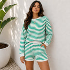 Green and white striped long-sleeve top and shorts two-piece set on Solazura model