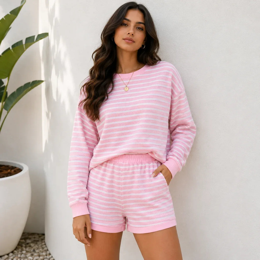 Pink striped long-sleeve top and shorts two-piece set on Solazura model