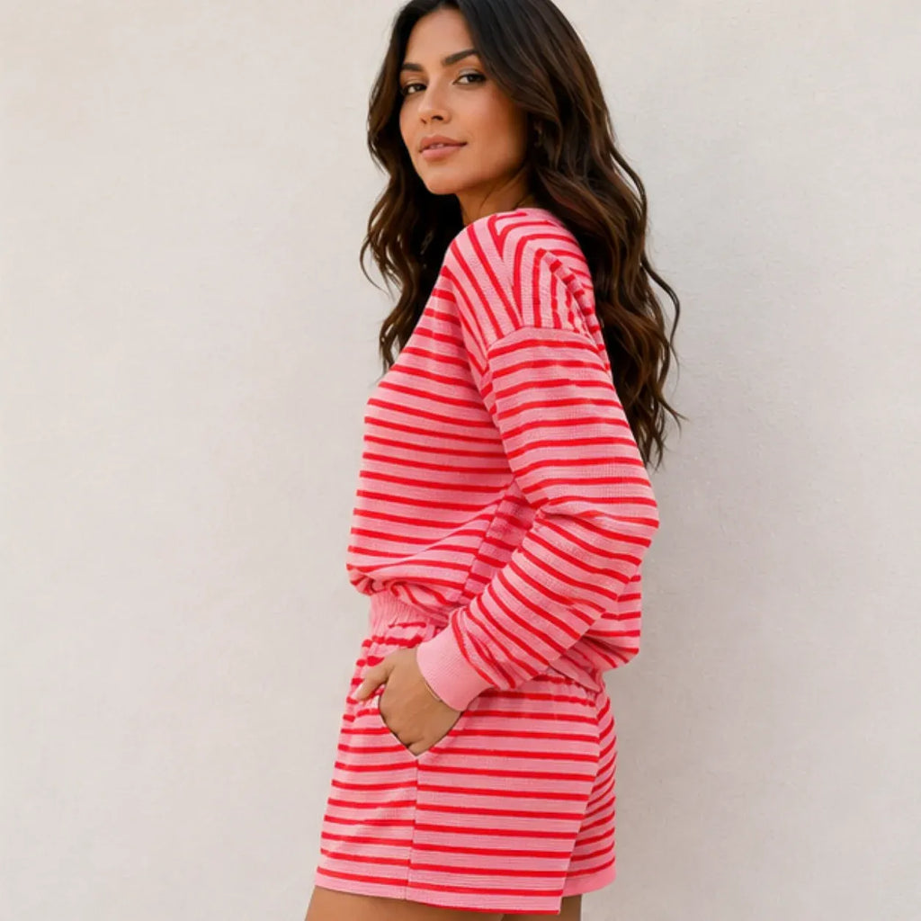 Side view of rose red striped long-sleeve top and shorts two-piece set