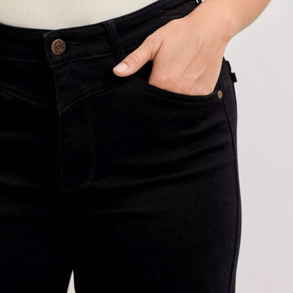 Detailed showcase of the premium cotton blend fabric on black wide-leg pants.