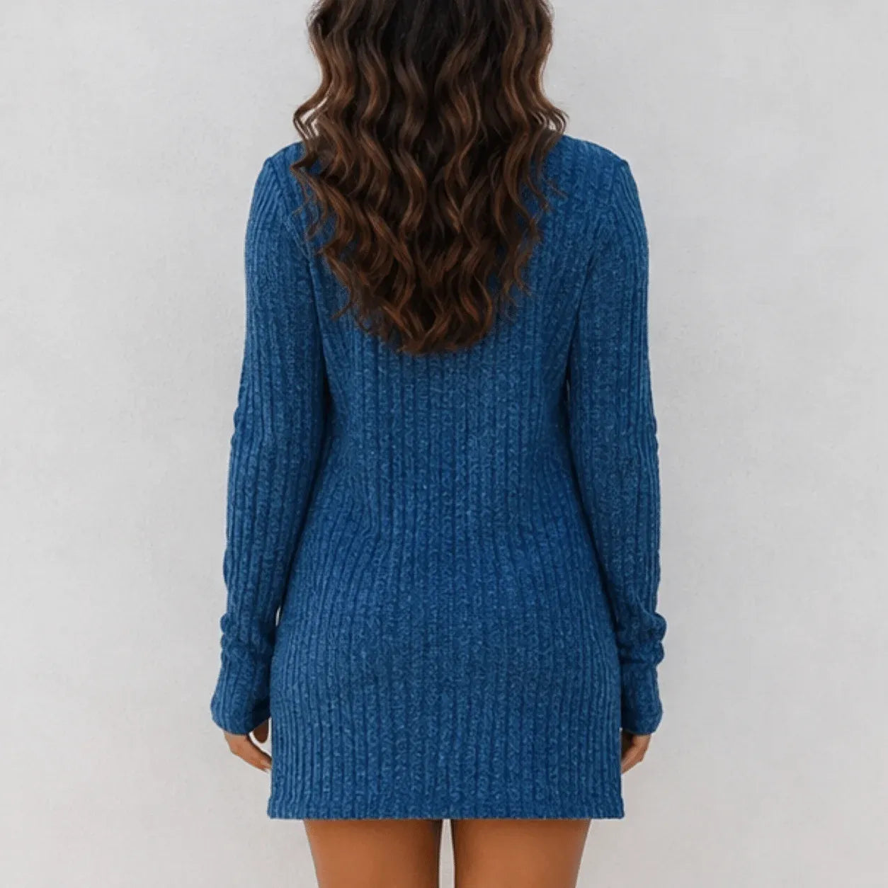 Back view of women's blue tailored mini dress and cardigan set with a figure-flattering ribbed knit design.