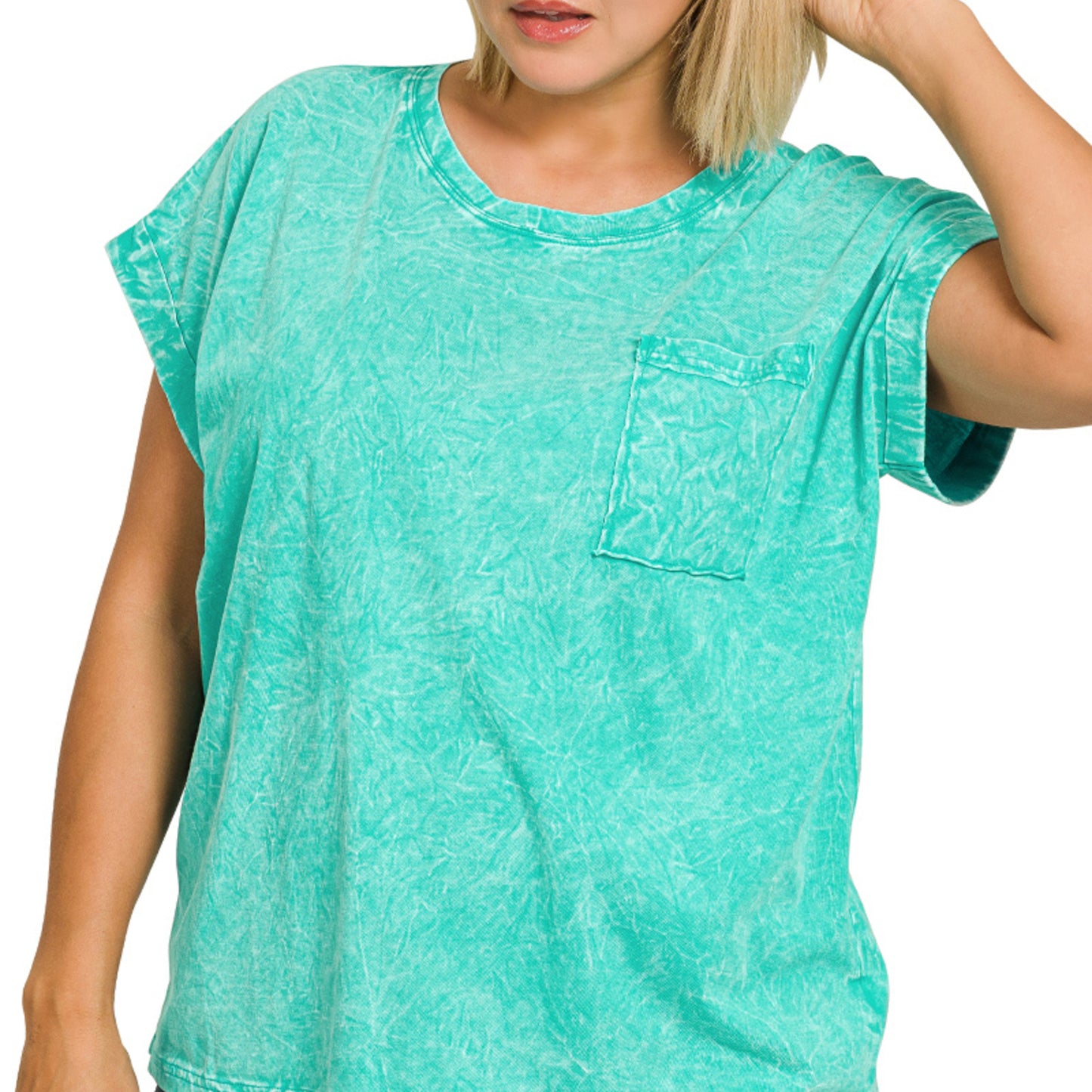 Close-up of the vintage crinkle-wash texture and chest pocket on the turquoise Zenana tee.